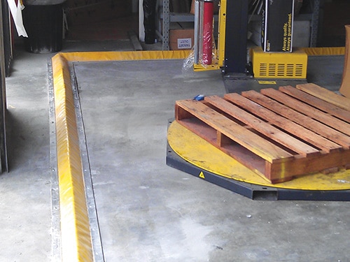 Yellow PVC Flexible Floor Bunding installed in workshop / warehouse