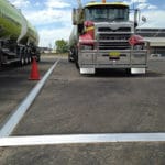 Chatoyer Aluminium Floor Bunding installed in a transport truck parking lot