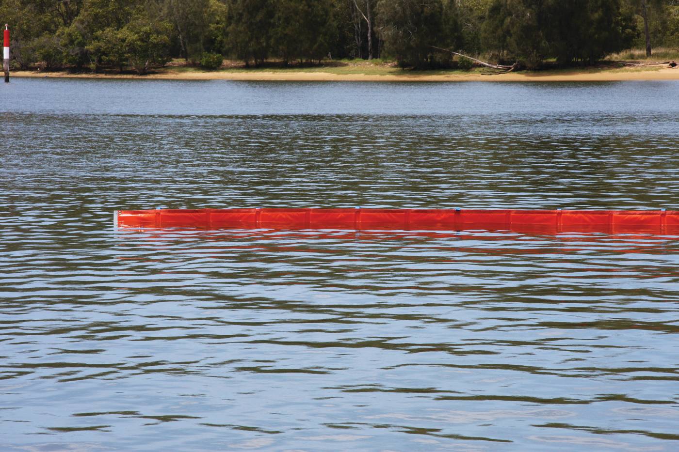 Chatoyer Fence Boom deployed in waterway
