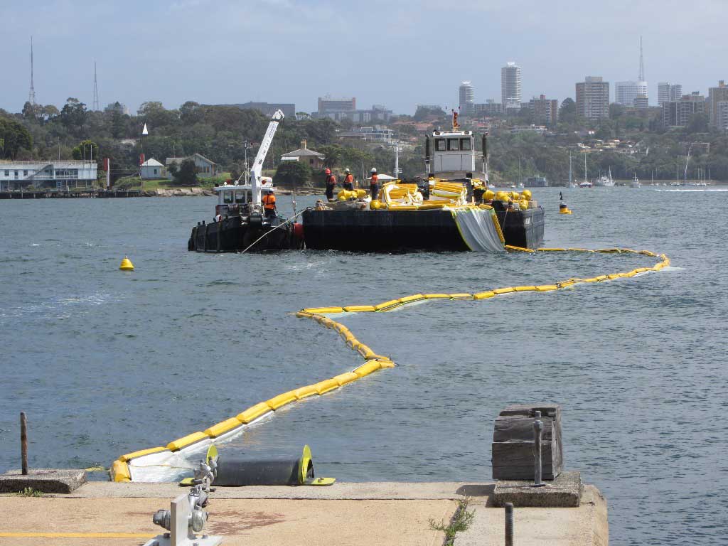 Chatoyer heavy duty silt curtain being installed around foreshore in Sydney Harbour at Barangaroo