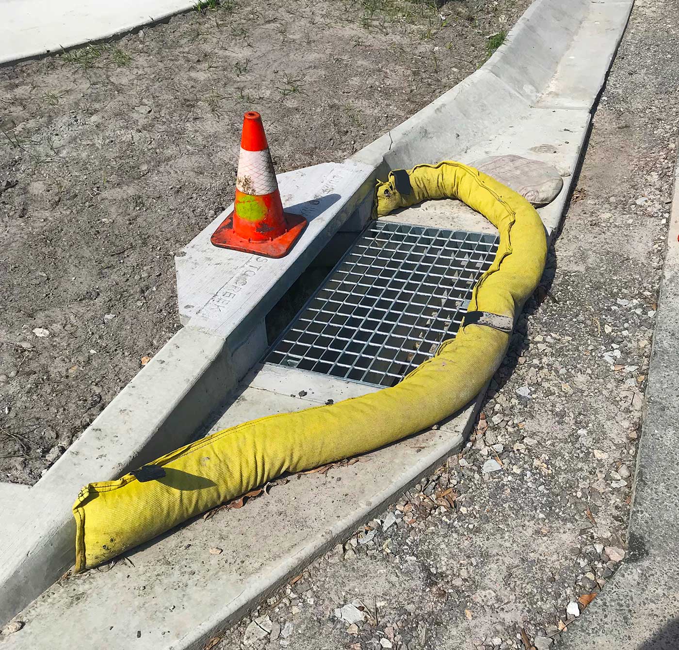Chatoyer 2m long Rubber Filled Silt Sock at Storm Drain during construction